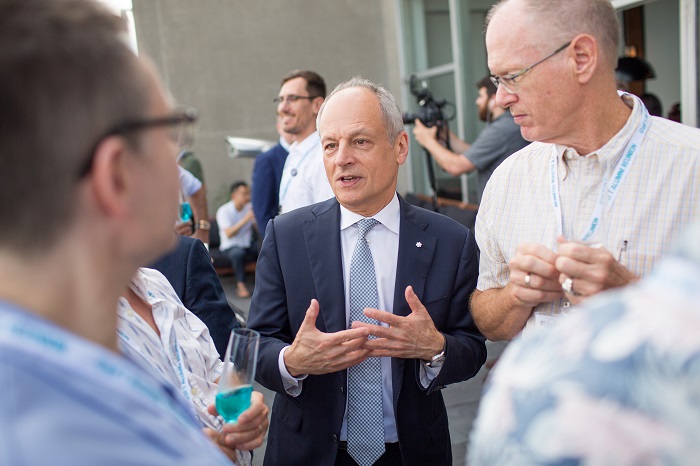 President Meric Gertler chatting with alumni at the LGBTQ+ Spring Soirée. Photo by Paul Terefenko.