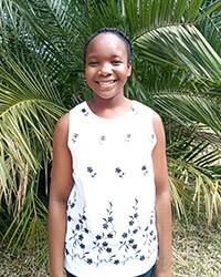 Portrait of Vimbainashe Chimhande smiling.
