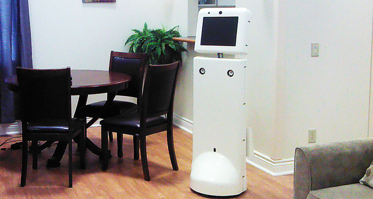 Ed the robot is a four-foot tall plastic column with a screen attached to the top like a head.