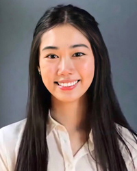 Portrait of Emily Zhou smiling.