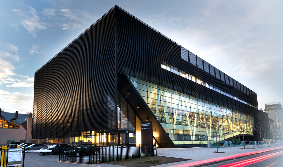 The Goldring Centre for High Performance Sport viewed from the southeast, at dusk.