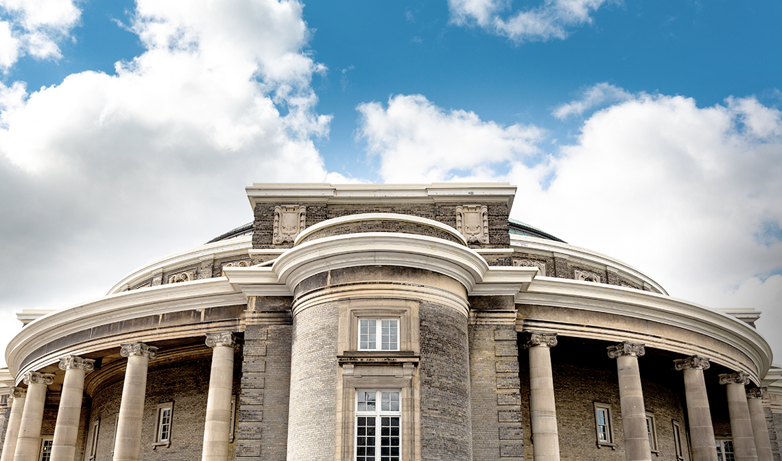 Convocation Hall with blue sky above.