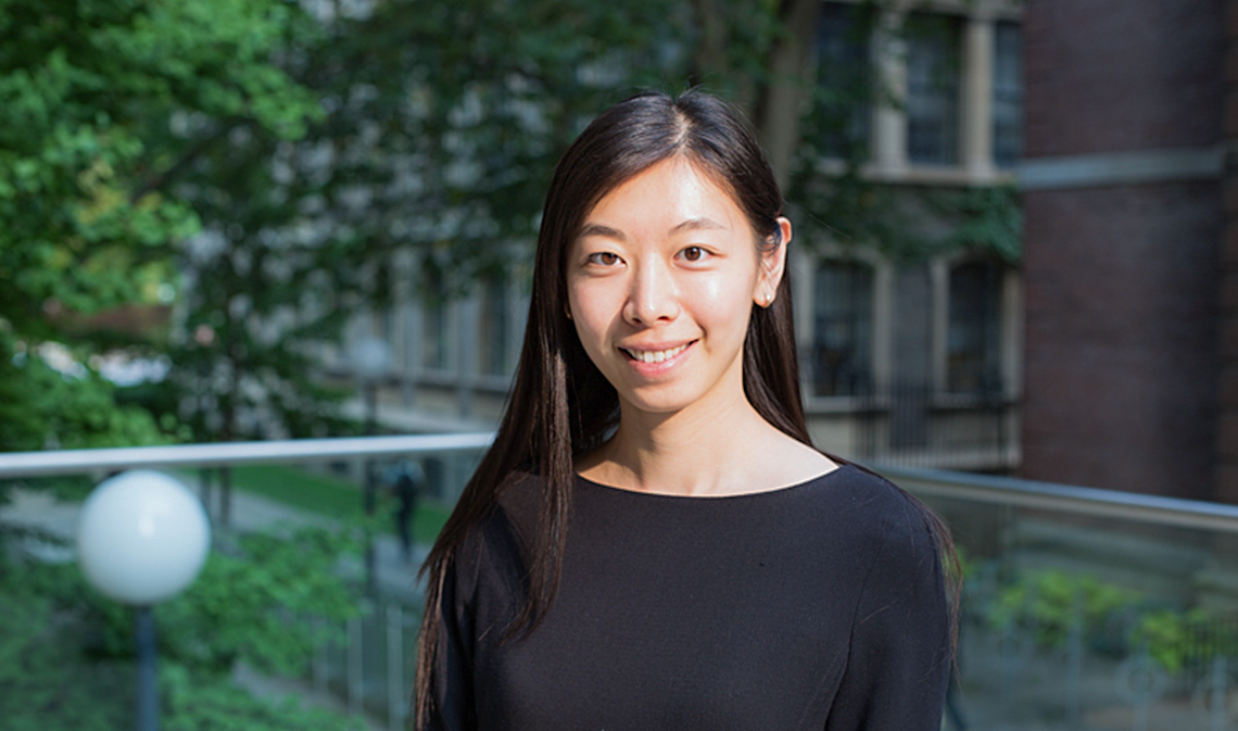 Stephanie Zhou smiling outdoors.